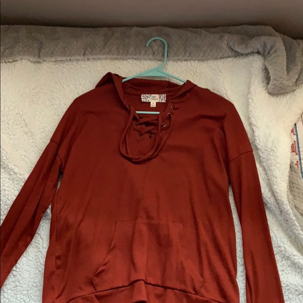 NEVERWORN long sleeve, lace up, hoodie.